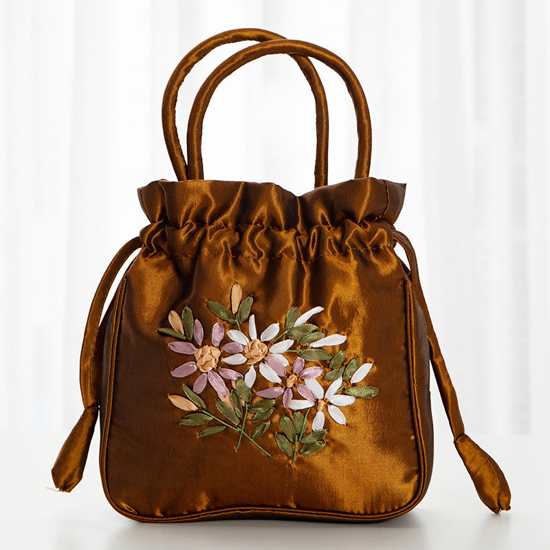 Hand-Embroidered Floral Drawstring Clutch Bag