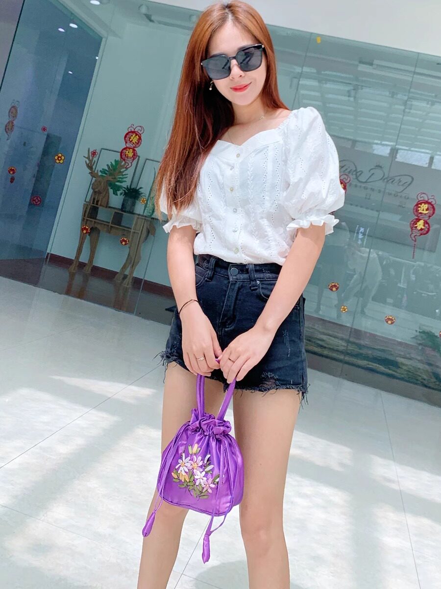 Hand-Embroidered Floral Drawstring Clutch Bag