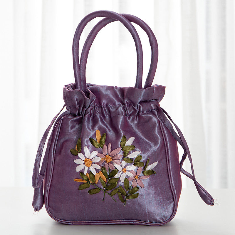 Hand-Embroidered Floral Drawstring Clutch Bag