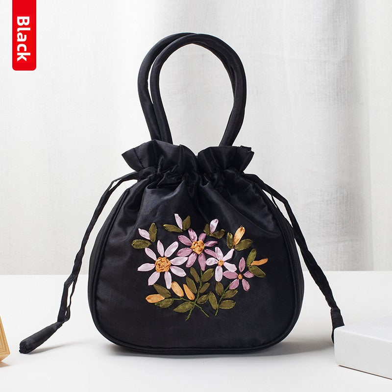 Hand-Embroidered Floral Drawstring Clutch Bag