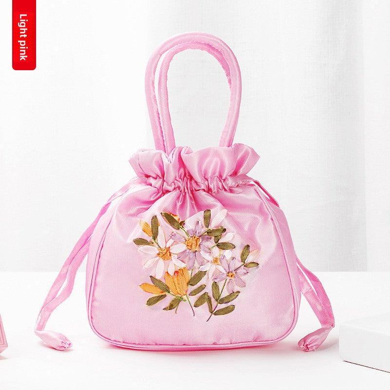Hand-Embroidered Floral Drawstring Clutch Bag