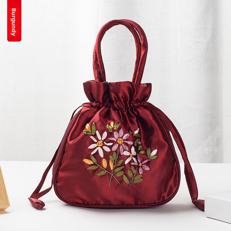 Hand-Embroidered Floral Drawstring Clutch Bag