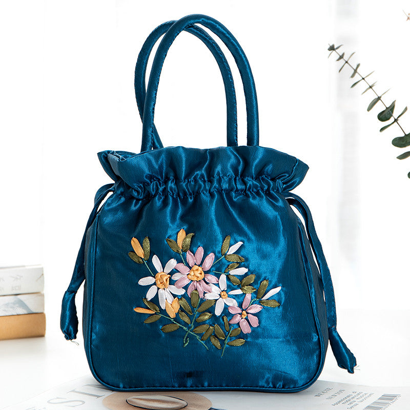 Hand-Embroidered Floral Drawstring Clutch Bag